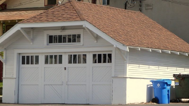 Install garage doors that will improve the curb appeal of your house